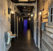Group solving a puzzle in a Charleston escape room
