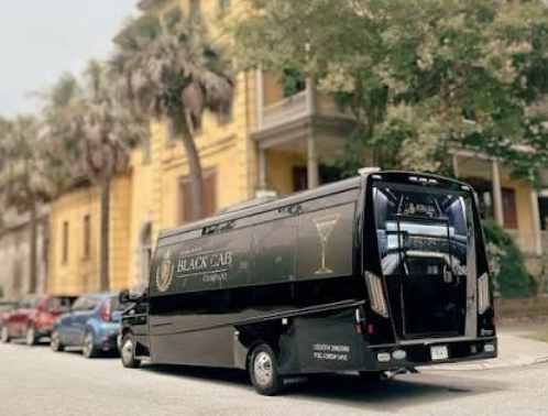 Vintage London-style black cab parked in downtown Charleston