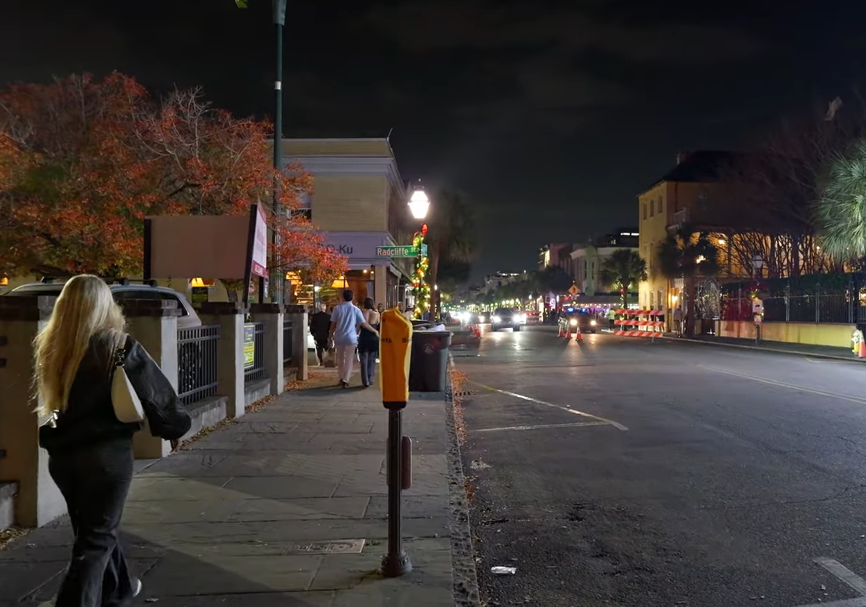 A group of friends laughing and shopping on King Street