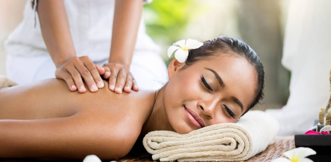 A serene spa relaxation room with plush chairs
